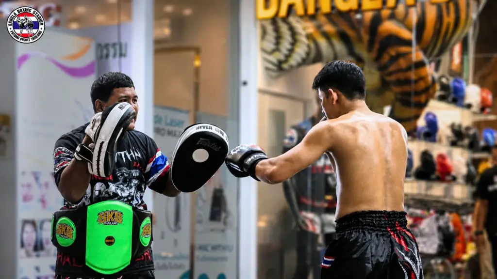 Pad work training session for Muay Thai in Patong