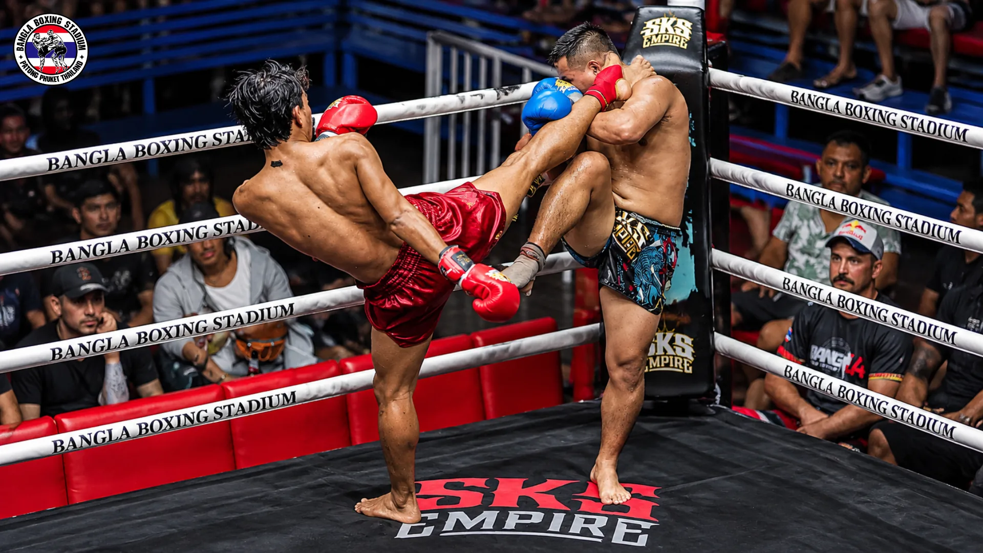 Muay Thai fighter landing a high kick in the corner at Bangla Boxing Stadium